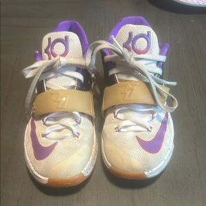 Nike Retro White and Purple Sneakers with Textured Upper